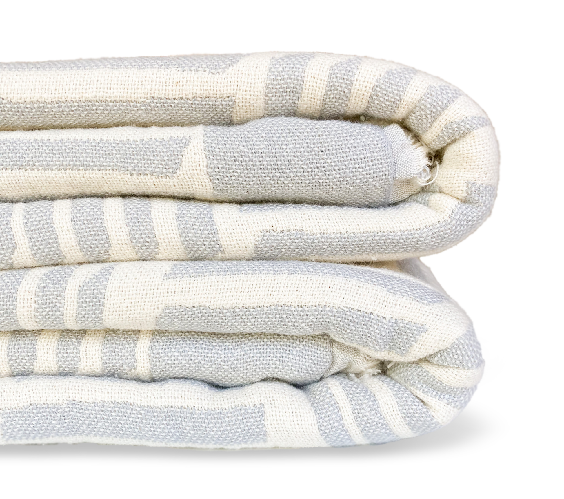 gray and ivory blanket with a modern geometric pattern folded up