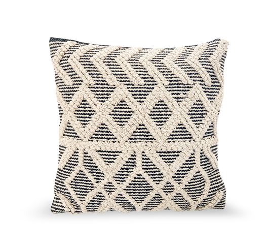 Pillow with dark gray and ivory tufts in a geometric pattern
