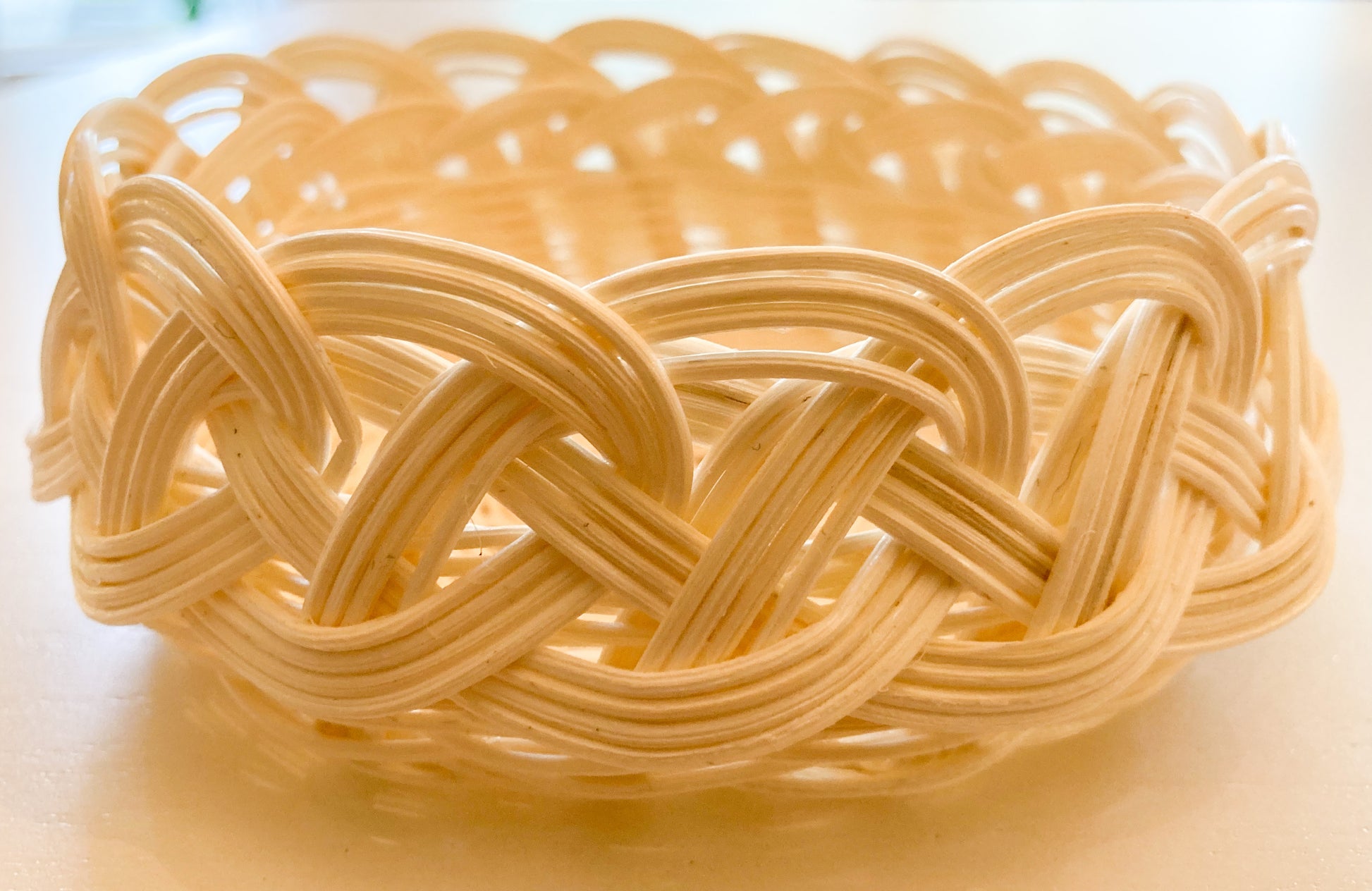 Small white woven bowl